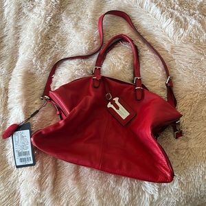 Medium size red crossbody bag.